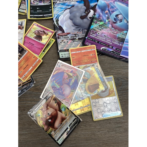 363 - A collection of Pokémon trading cards to include Japanese etc.