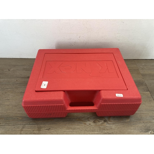 364 - A K'Nex red plastic carrycase containing K'nex