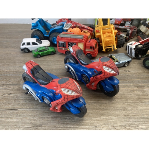 367 - A collection of model vehicles to include Deluxe Race set, Disney Cars etc.