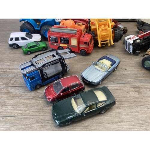 367 - A collection of model vehicles to include Deluxe Race set, Disney Cars etc.