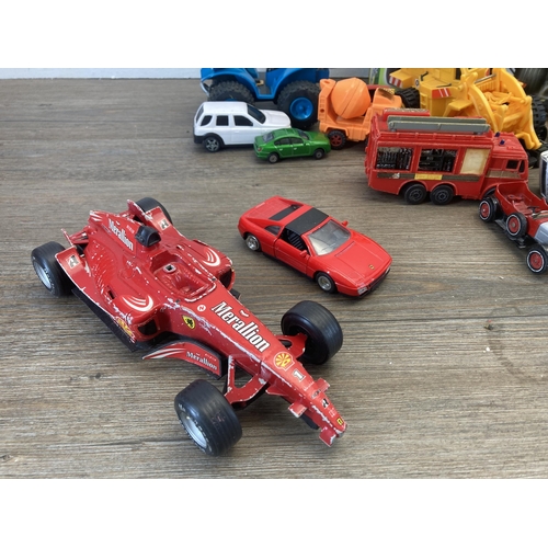 367 - A collection of model vehicles to include Deluxe Race set, Disney Cars etc.