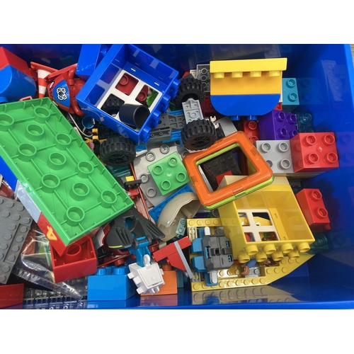 369 - A Lego blue plastic storage box containing Lego