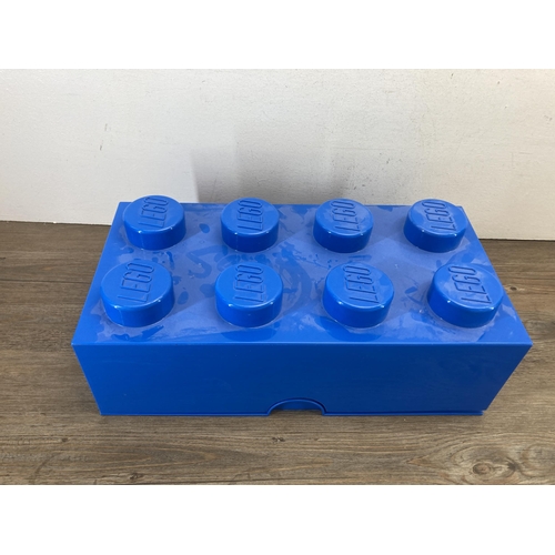 369 - A Lego blue plastic storage box containing Lego