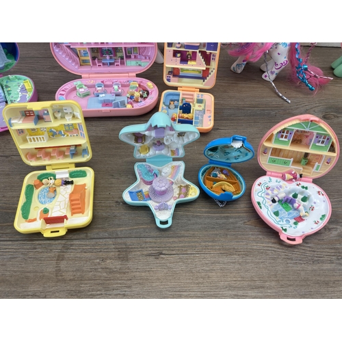 371 - A collection of 1990s Polly Pocket miniature play sets together with four My Little Pony figurines