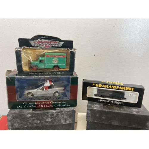 376 - A collection of boxed and unboxed diecast model vehicles to include Matchbox Models of Yesteryear, L... 