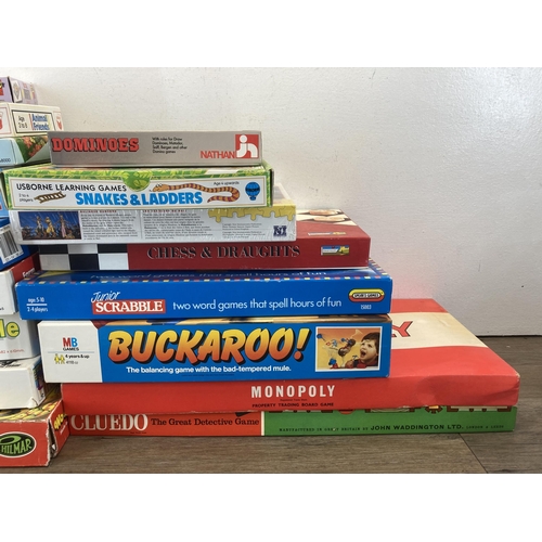 379 - A collection of board games to include Monopoly, Kongman etc.