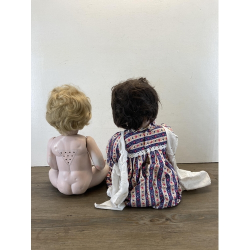 386 - Two early 20th century composition dolls