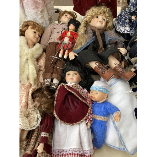 389 - A collection of mostly porcelain dolls to include Regency Fine Arts Hayley, Dolls of Distinction Oli... 