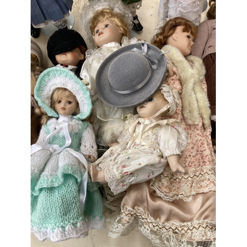 389 - A collection of mostly porcelain dolls to include Regency Fine Arts Hayley, Dolls of Distinction Oli... 