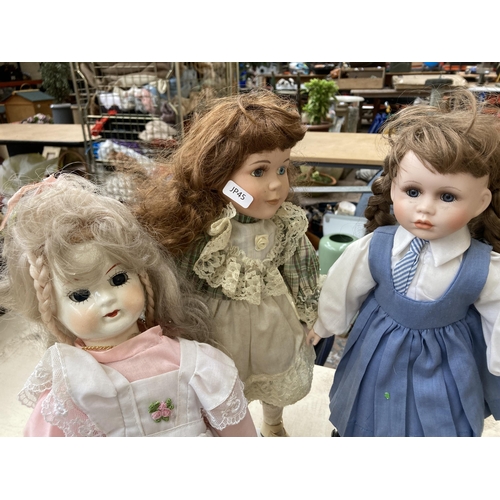 389 - A collection of mostly porcelain dolls to include Regency Fine Arts Hayley, Dolls of Distinction Oli... 