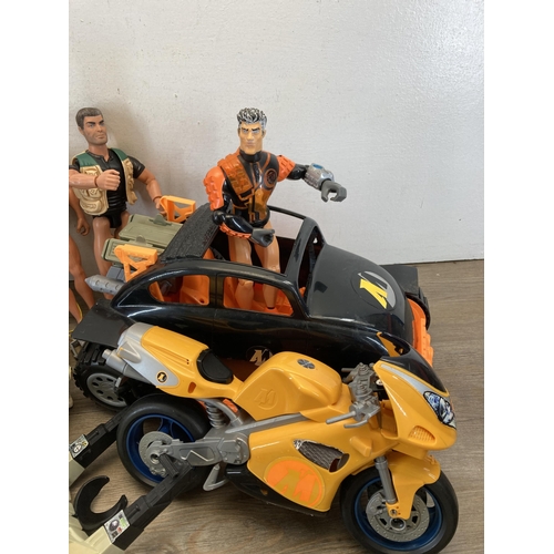 392 - A collection of Action Man figures and accessories