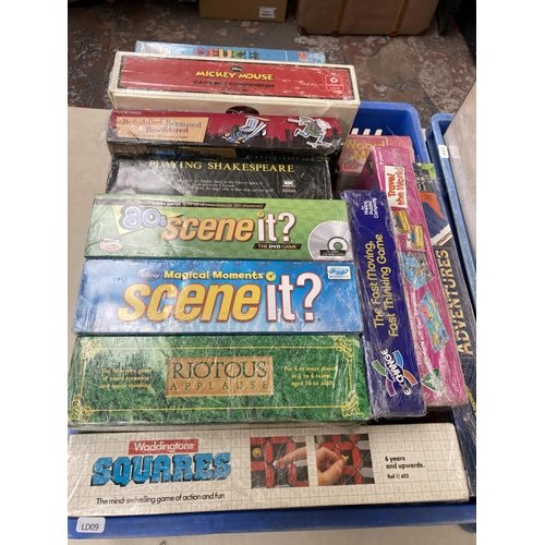 393 - Three boxes containing a collection of toys, board games and jigsaw puzzles