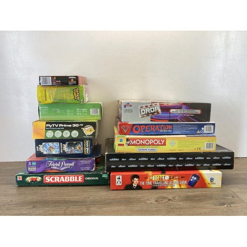 395 - A collection of board games to include Disney Cars 2 Operation, Monopoly etc.