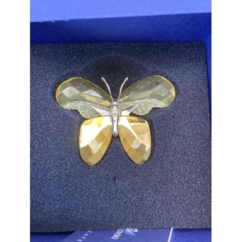 295 - Three boxed Swarovski Crystal butterfly figurines to include Almina model no. 861934, Adena model no... 