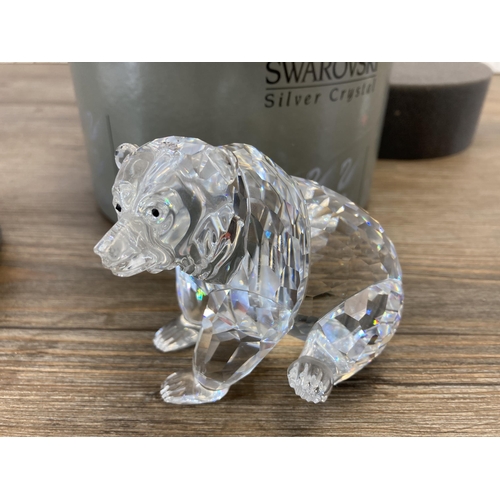 303 - Four boxed Swarovski Crystal bear figurines to include Kris Bear with Skis model no. 234710, Kris Be... 