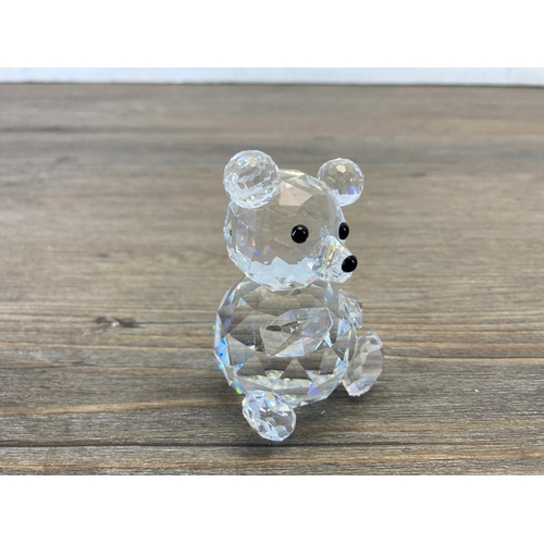 303 - Four boxed Swarovski Crystal bear figurines to include Kris Bear with Skis model no. 234710, Kris Be... 