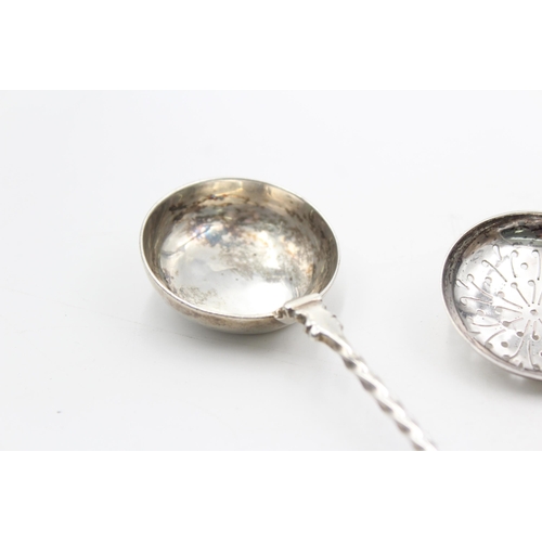 1293 - Three pieces of hallmarked sterling silver, one sugar sifter and two ladles - approx. gross weight 7... 