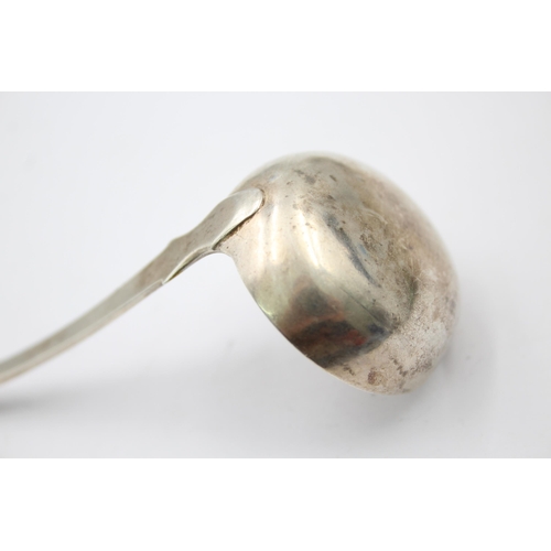 1297 - A George IV sterling silver cream ladle, hallmarked Edinburgh 1827 - approx. gross weight 25 grams a... 