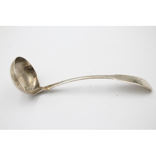 1297 - A George IV sterling silver cream ladle, hallmarked Edinburgh 1827 - approx. gross weight 25 grams a... 