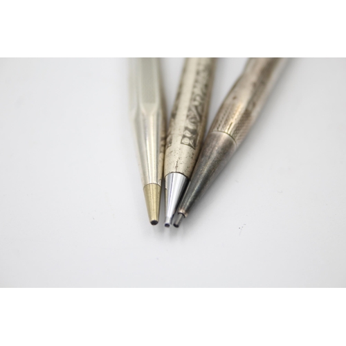 1299 - Three sterling silver propelling pencils to include Sheaffer etc. - approx. gross weight 60 grams