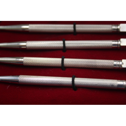 1314 - Four vintage hallmarked sterling silver propelling pencils - approx. gross weight 24 grams and 8.7cm... 