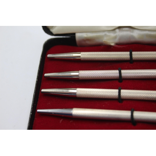 1314 - Four vintage hallmarked sterling silver propelling pencils - approx. gross weight 24 grams and 8.7cm... 