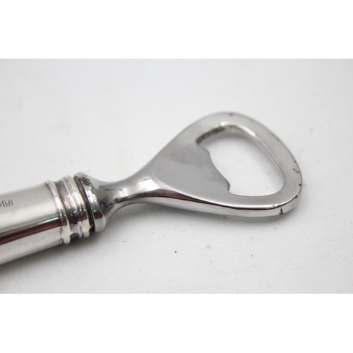 1334 - A boxed stamped .800 silver handled bottle opener - approx. gross weight 137 grams and 16cm long