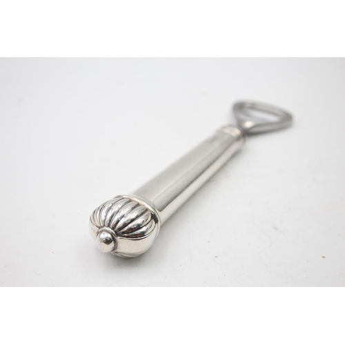 1334 - A boxed stamped .800 silver handled bottle opener - approx. gross weight 137 grams and 16cm long