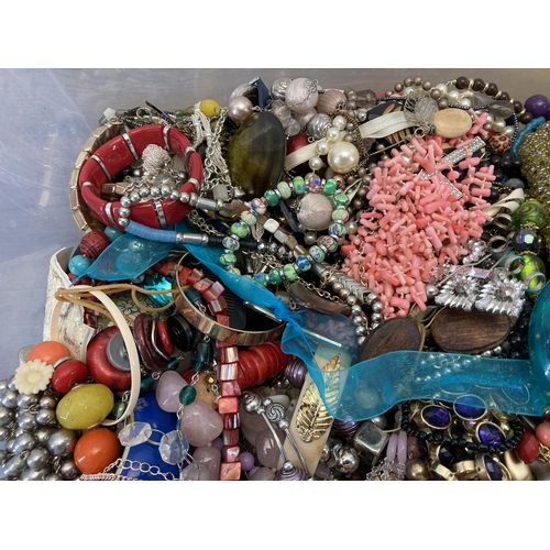 419 - A box containing a large quantity of costume jewellery