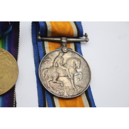 1392 - A WWI medal pair and ribbons presented to 335007 Pnr. D. Jones RE