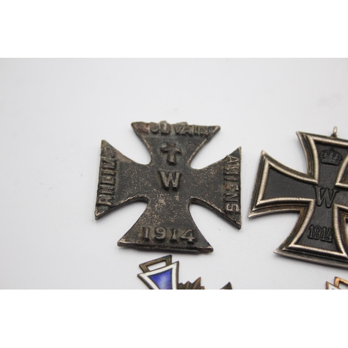 1395 - Five German medals to include WWI Iron Cross, Honorary Medal of the Legion etc.