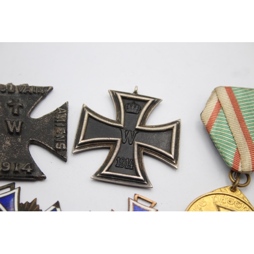 1395 - Five German medals to include WWI Iron Cross, Honorary Medal of the Legion etc.