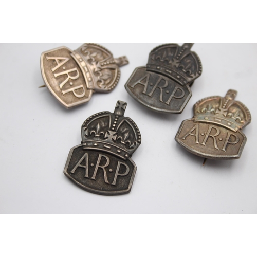 1397 - Four WWII sterling silver ARP badges - approx. gross weight 39 grams