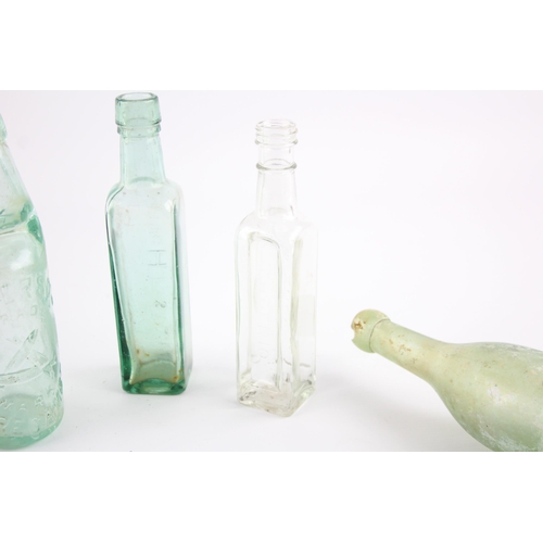 326F - Four antique and vintage glass bottles to include Torpedo, Codd-neck etc.