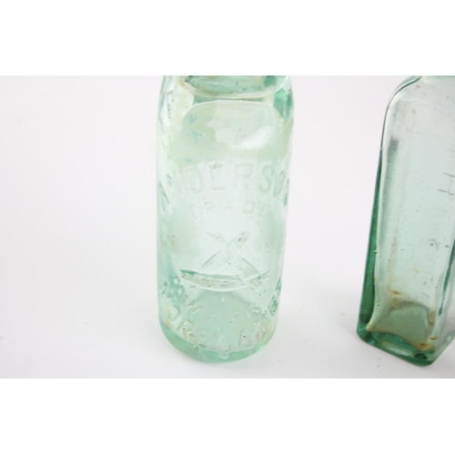 326F - Four antique and vintage glass bottles to include Torpedo, Codd-neck etc.