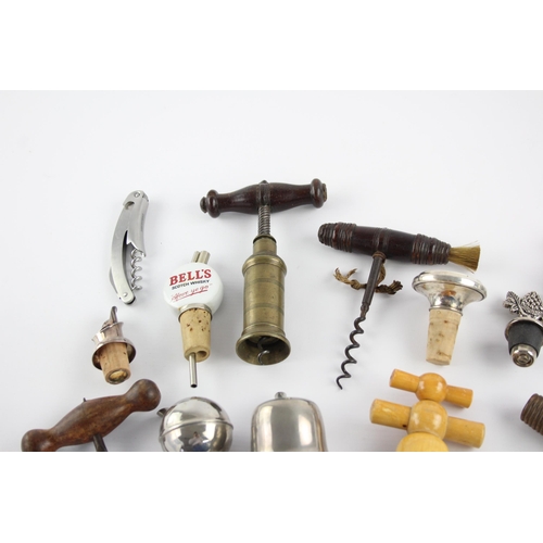 346 - Approx. twenty corkscrews and bottle openers to include bells, wood etc.