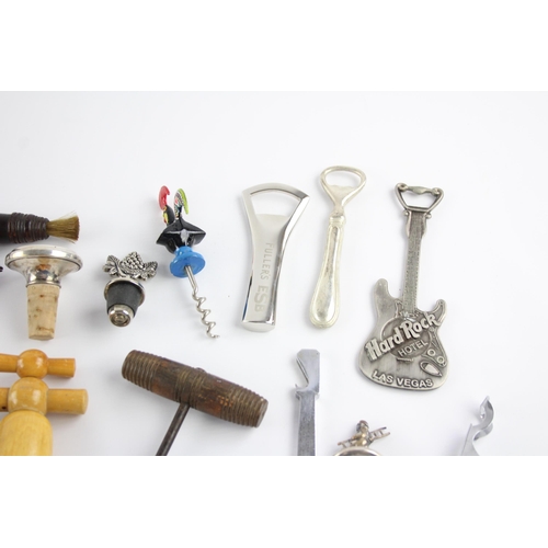 346 - Approx. twenty corkscrews and bottle openers to include bells, wood etc.