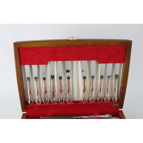 352 - A vintage silver plate seventy two piece cutlery set with wooden canteen