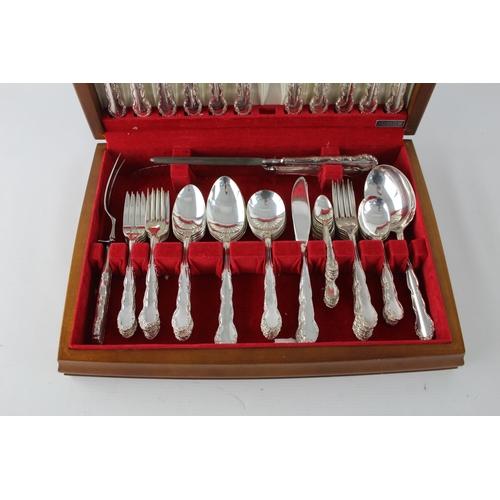 352 - A vintage silver plate seventy two piece cutlery set with wooden canteen