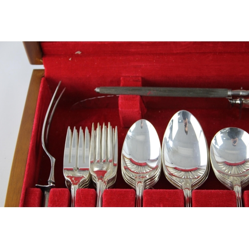 352 - A vintage silver plate seventy two piece cutlery set with wooden canteen