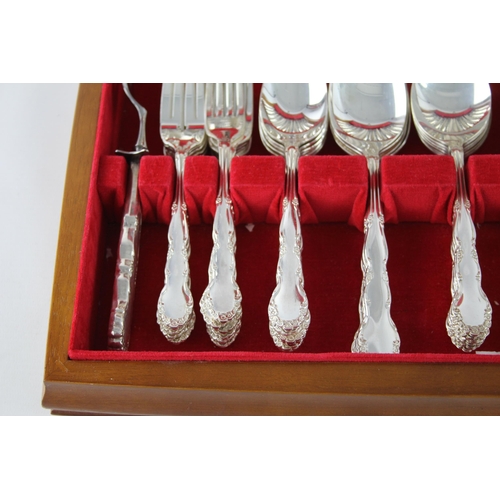 352 - A vintage silver plate seventy two piece cutlery set with wooden canteen