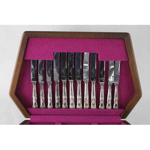 357 - A vintage silver plate forty four piece cutlery set with wooden canteen