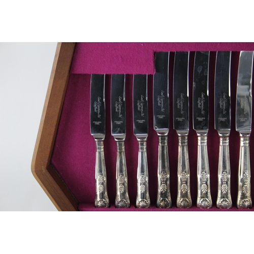 357 - A vintage silver plate forty four piece cutlery set with wooden canteen