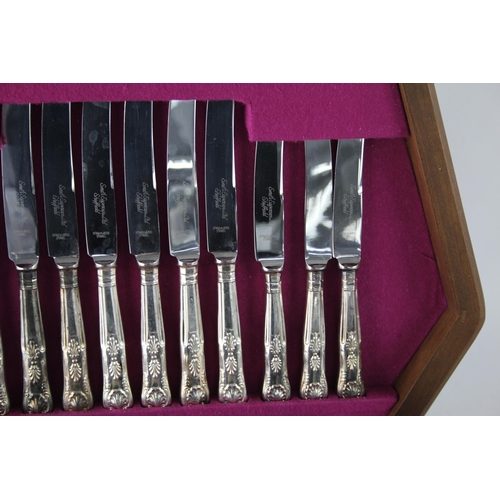 357 - A vintage silver plate forty four piece cutlery set with wooden canteen