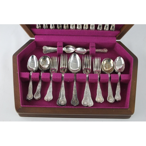 357 - A vintage silver plate forty four piece cutlery set with wooden canteen