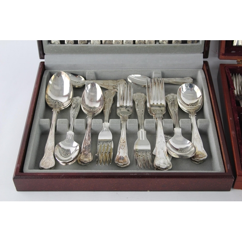 359 - Two vintage silver plate cutlery sets with wooden canteens