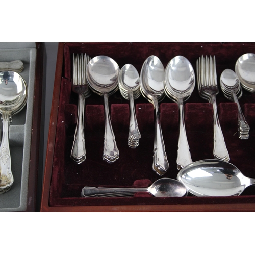 359 - Two vintage silver plate cutlery sets with wooden canteens