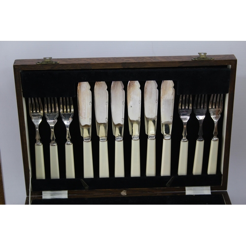 360 - Three vintage wooden cased silver plated cutlery sets