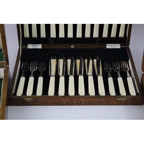 360 - Three vintage wooden cased silver plated cutlery sets