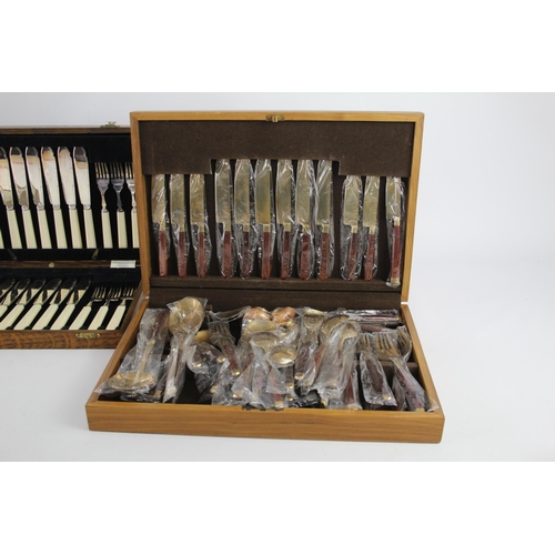 360 - Three vintage wooden cased silver plated cutlery sets